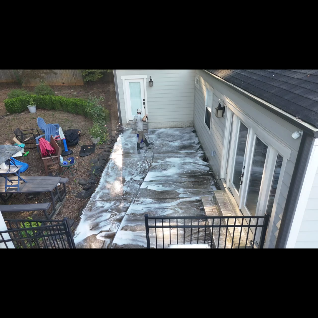 Pre-Treating patio before pressure washing